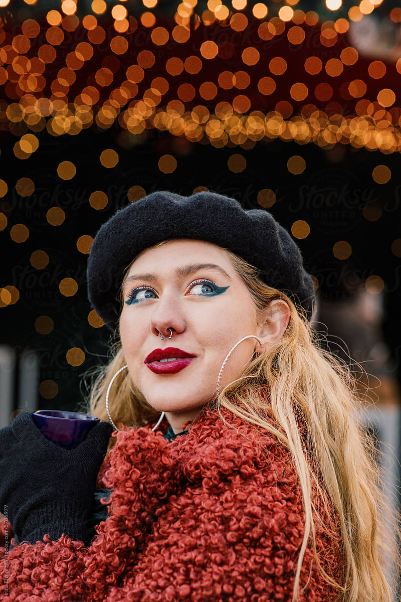 Winter Sip: Blond Woman and Mulled Wine Glow