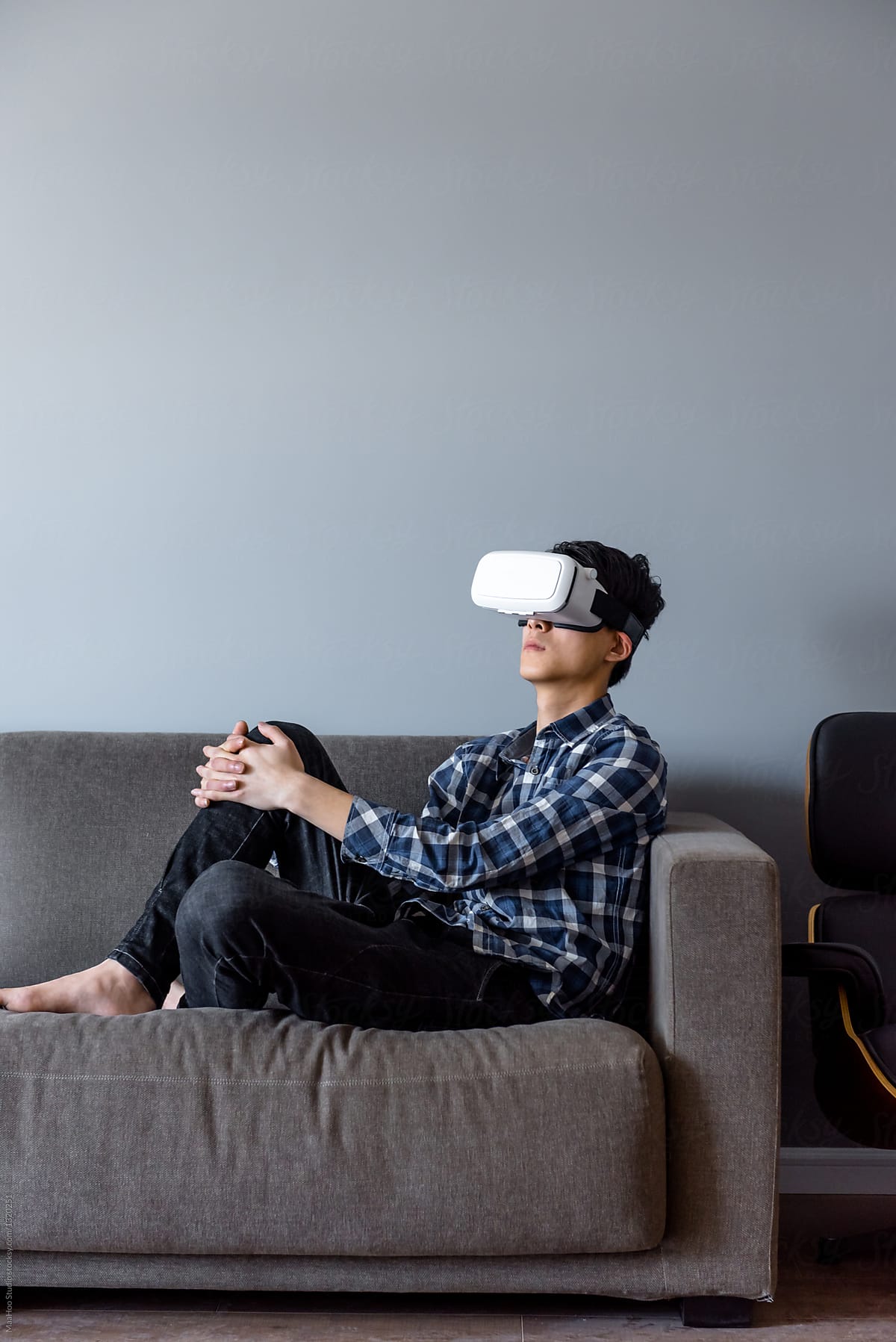 Young man wearing virtual reality headset