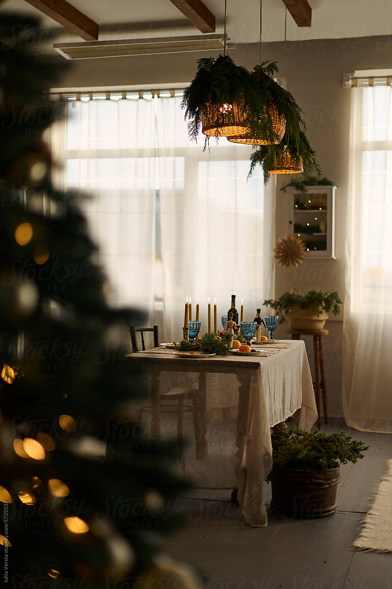 winter decorated table with candles