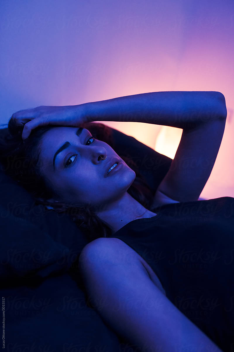 Attractive woman in blue light