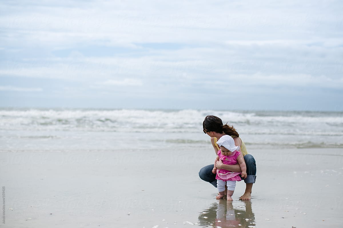 A Mother And Daughter Playing On A Beach By Stocksy Contributor Jakob Lagerstedt Stocksy