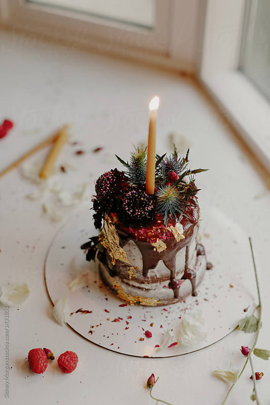 Small Birthday Cake with Flowers and a Candle
