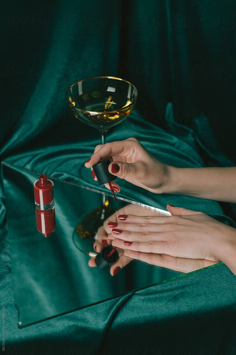 A woman doing her nail polish
