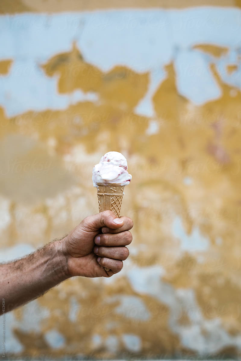 Crop person with ice cream cone