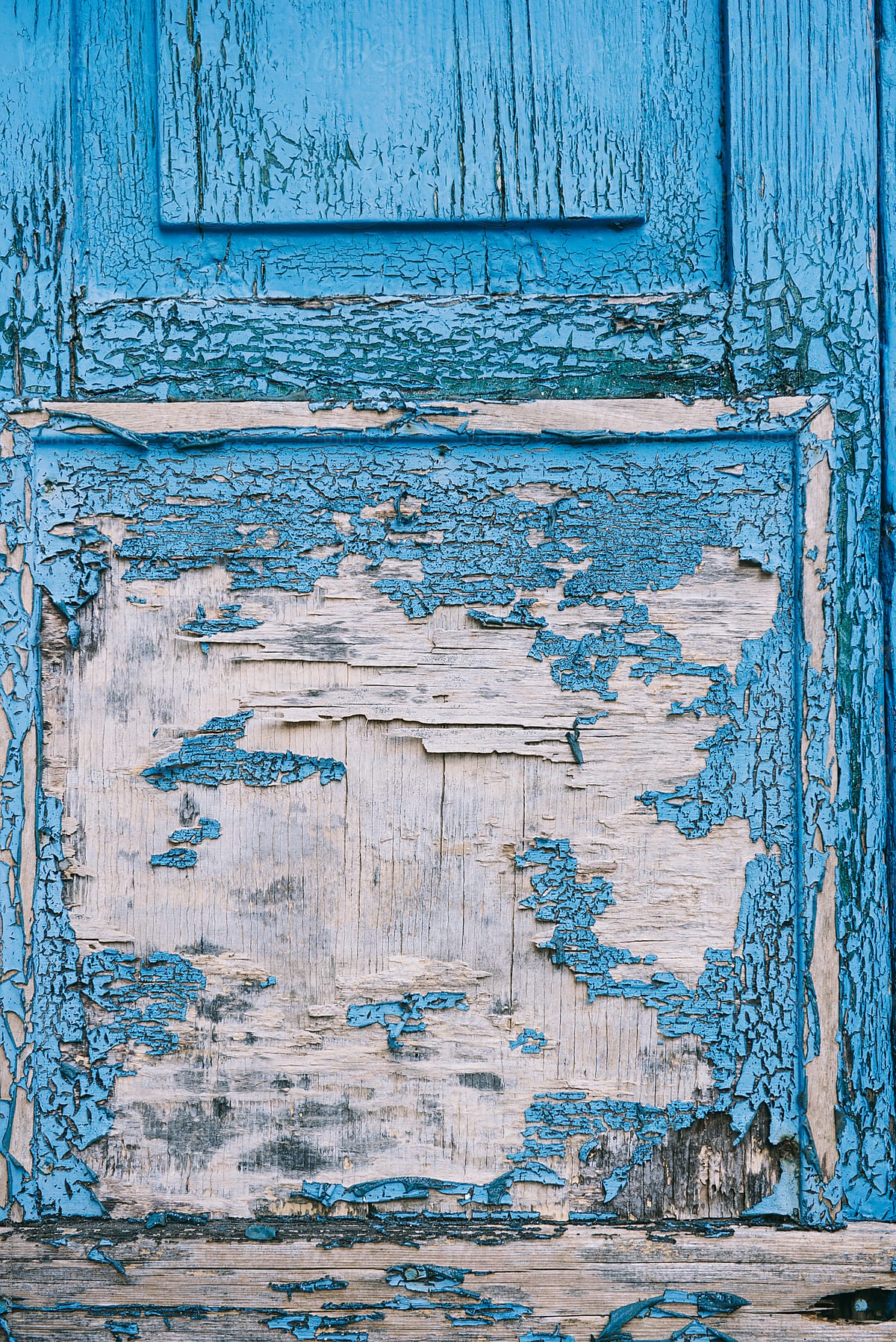 Weathered old blue painted door