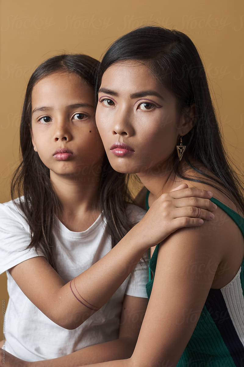 "Beautiful Asian Mom And Kid Portrait" by Stocksy Contributor