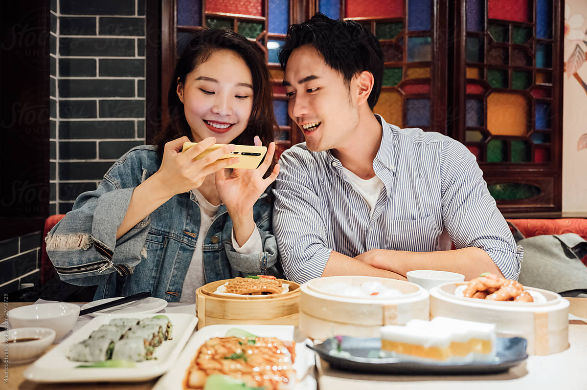 Young couple having dinner in restaurant