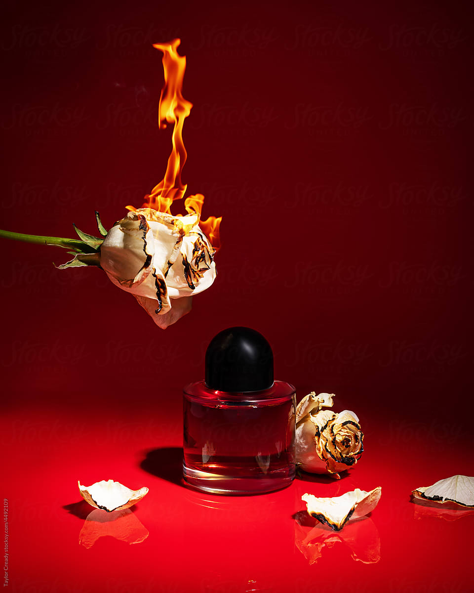 Red Perfume Bottle with Burnt Roses