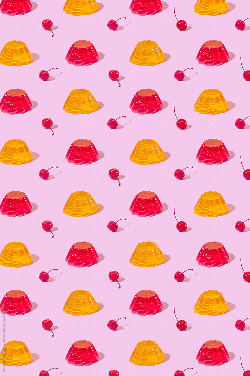 Seamless pattern of jelly pudding and red cocktail cherries