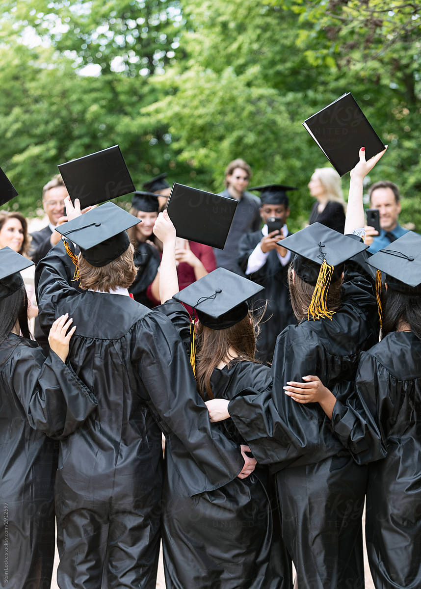 Retro Styled Portrait of Two Happy Graduating Students. Two Smiling  Embracing Friends Girl in Graduation Caps and Gowns Stock Photo - Image of  achievement, smiling: 69099950