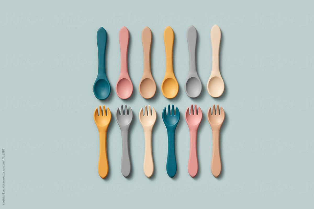 Kids spoons and forks in pastel colors