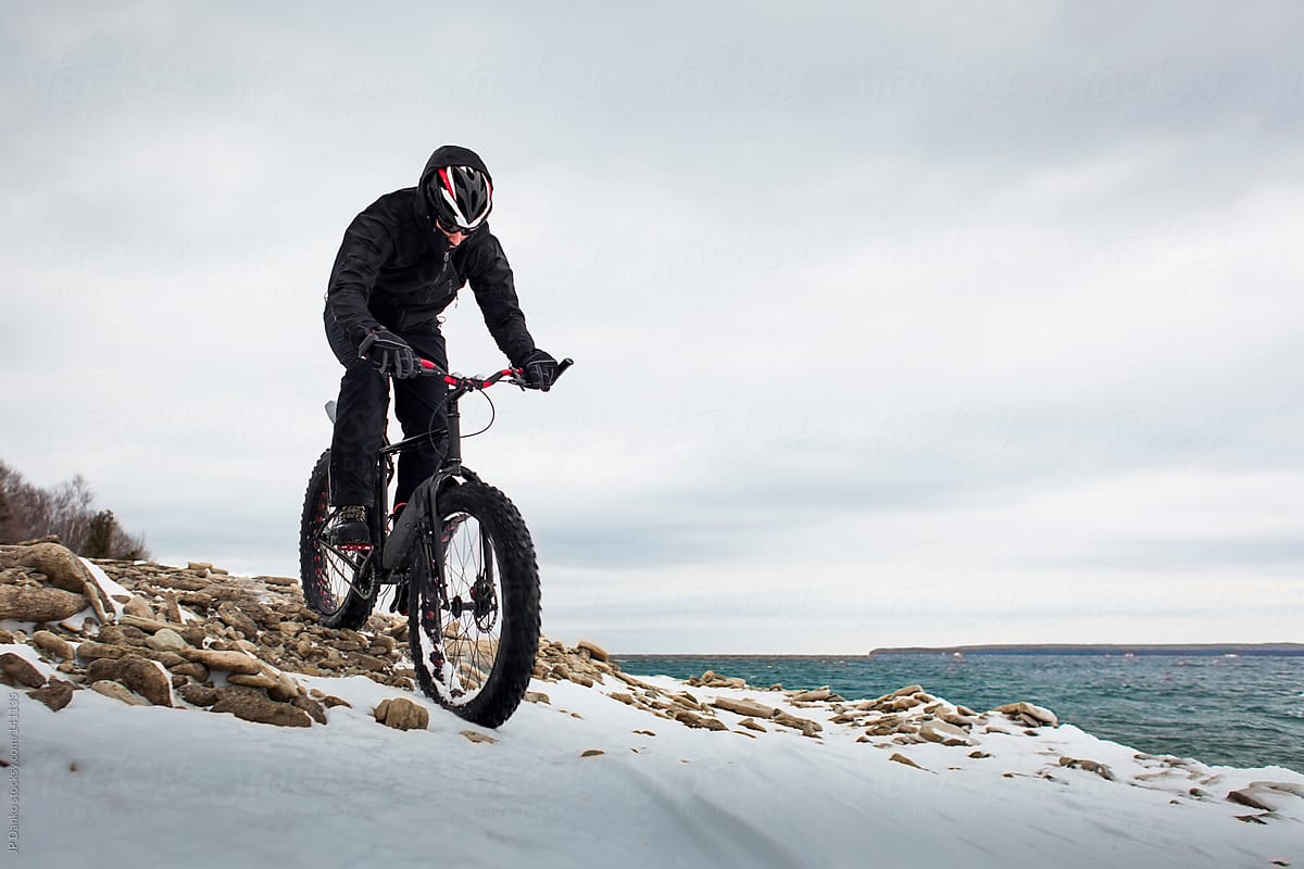 Extreme Sport Winter Mountain Bike Race In Snow on Fat Bike