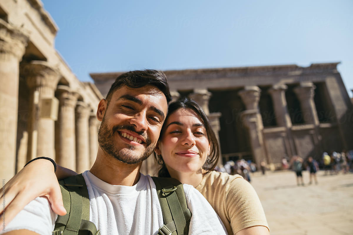 Selfie of a young couple at the Edfu Temple, Egypt.