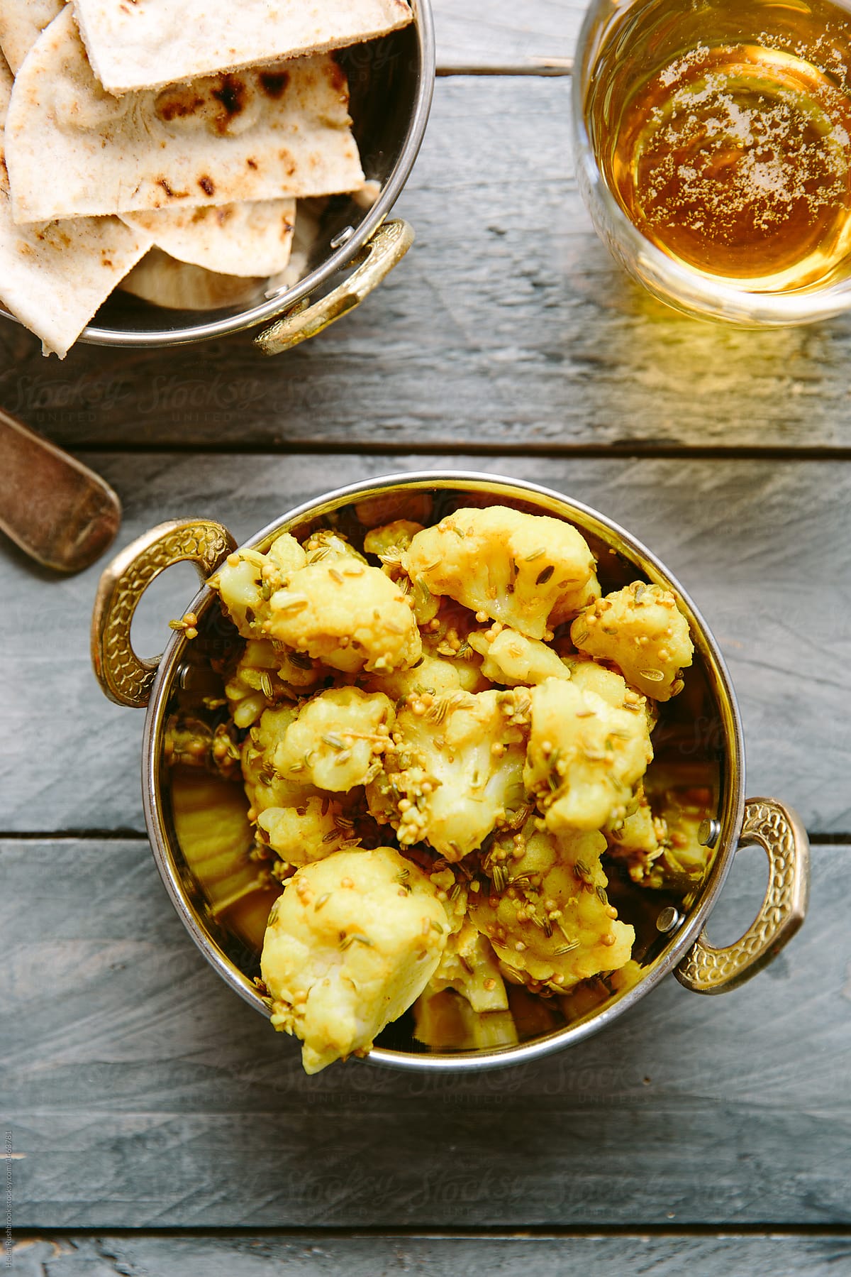 An indian dish of cauliflower cooked with whole spices