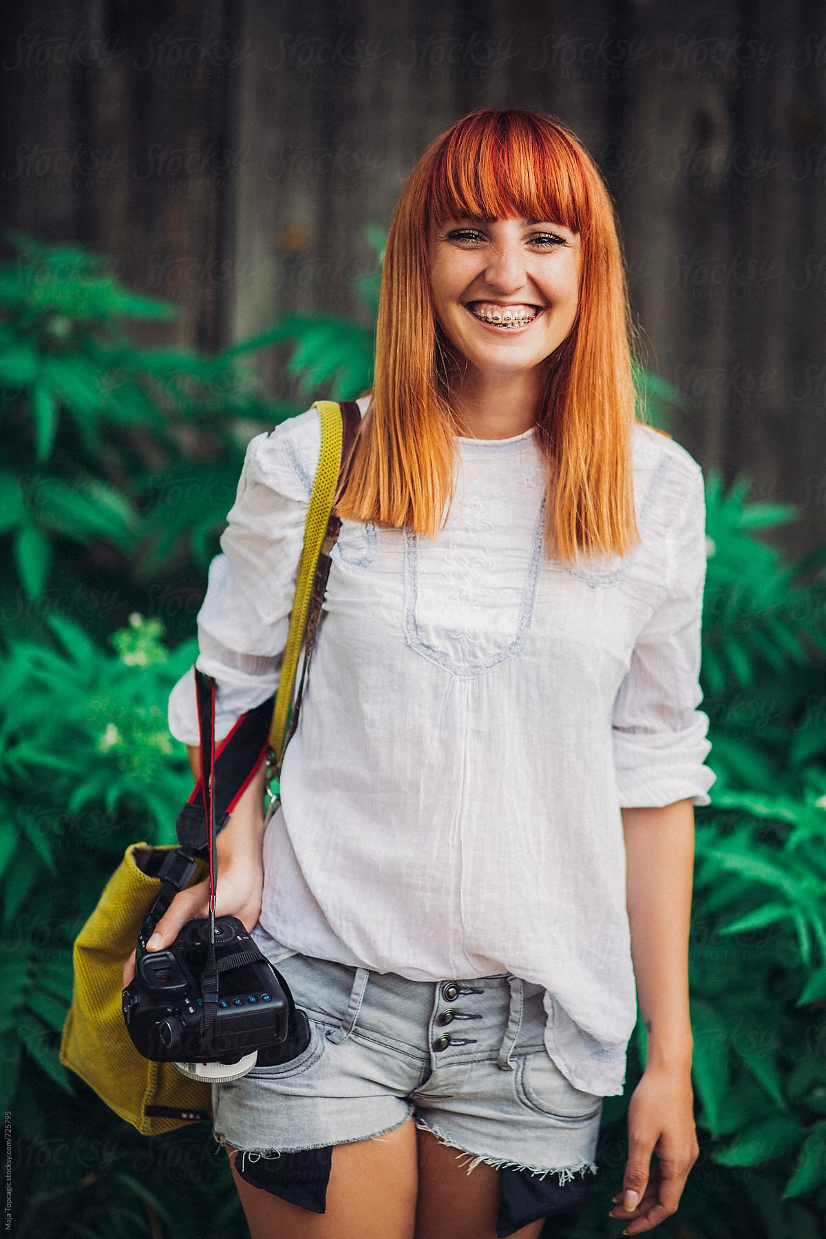 «female Photographer Smiling Outdoors Del Colaborador De Stocksy «maja