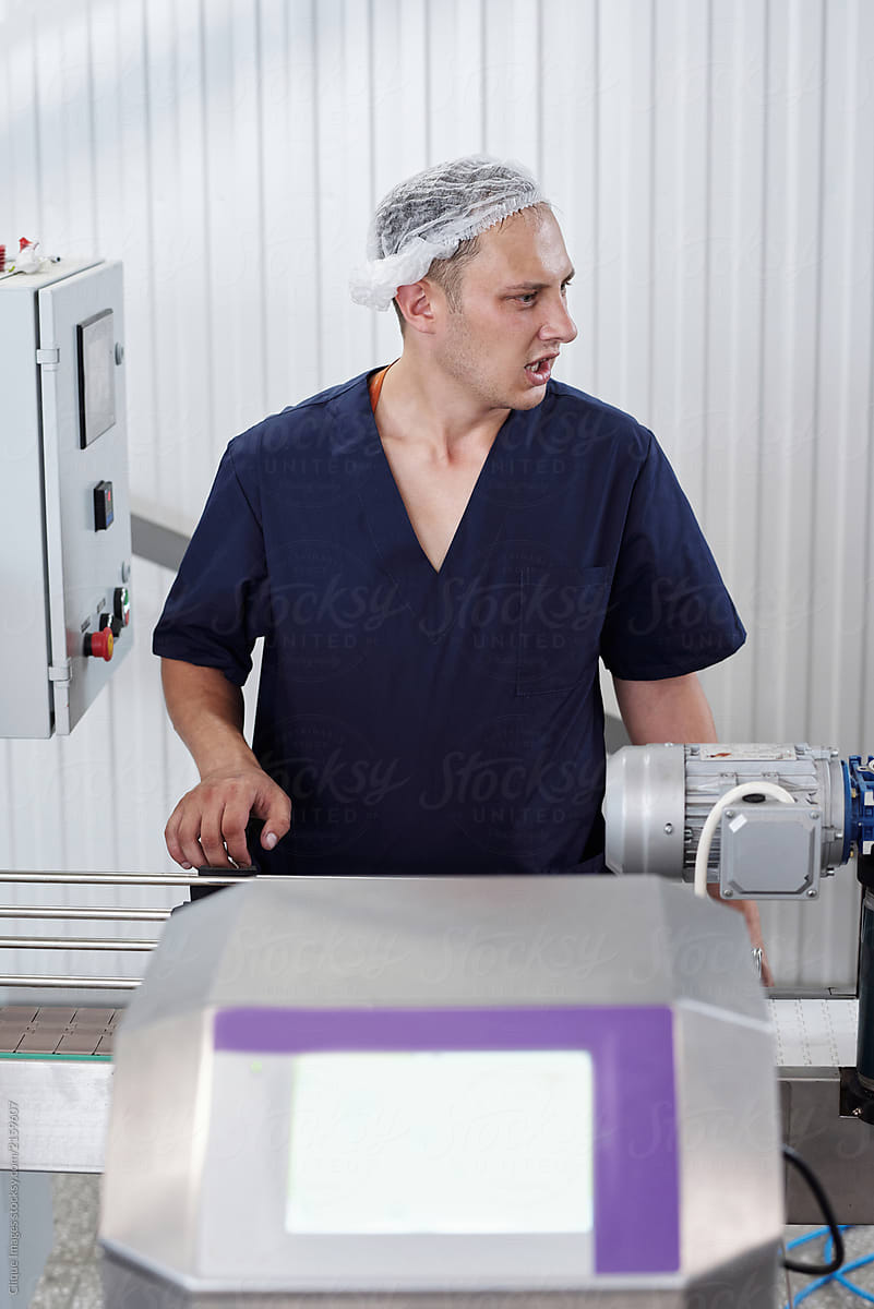 Factory Worker Monitoring Production