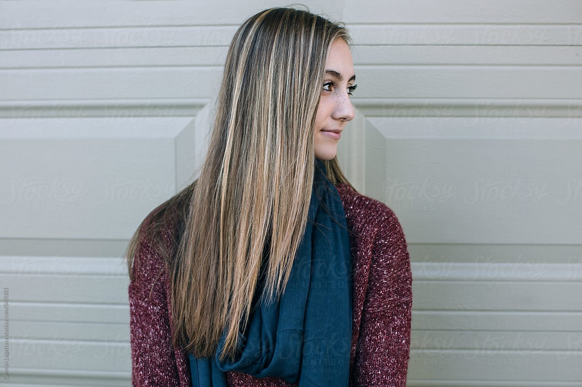 Profile Of A Beautiful Teenage Girl With Long Blonde Hair By Stocksy Contributor Carolyn