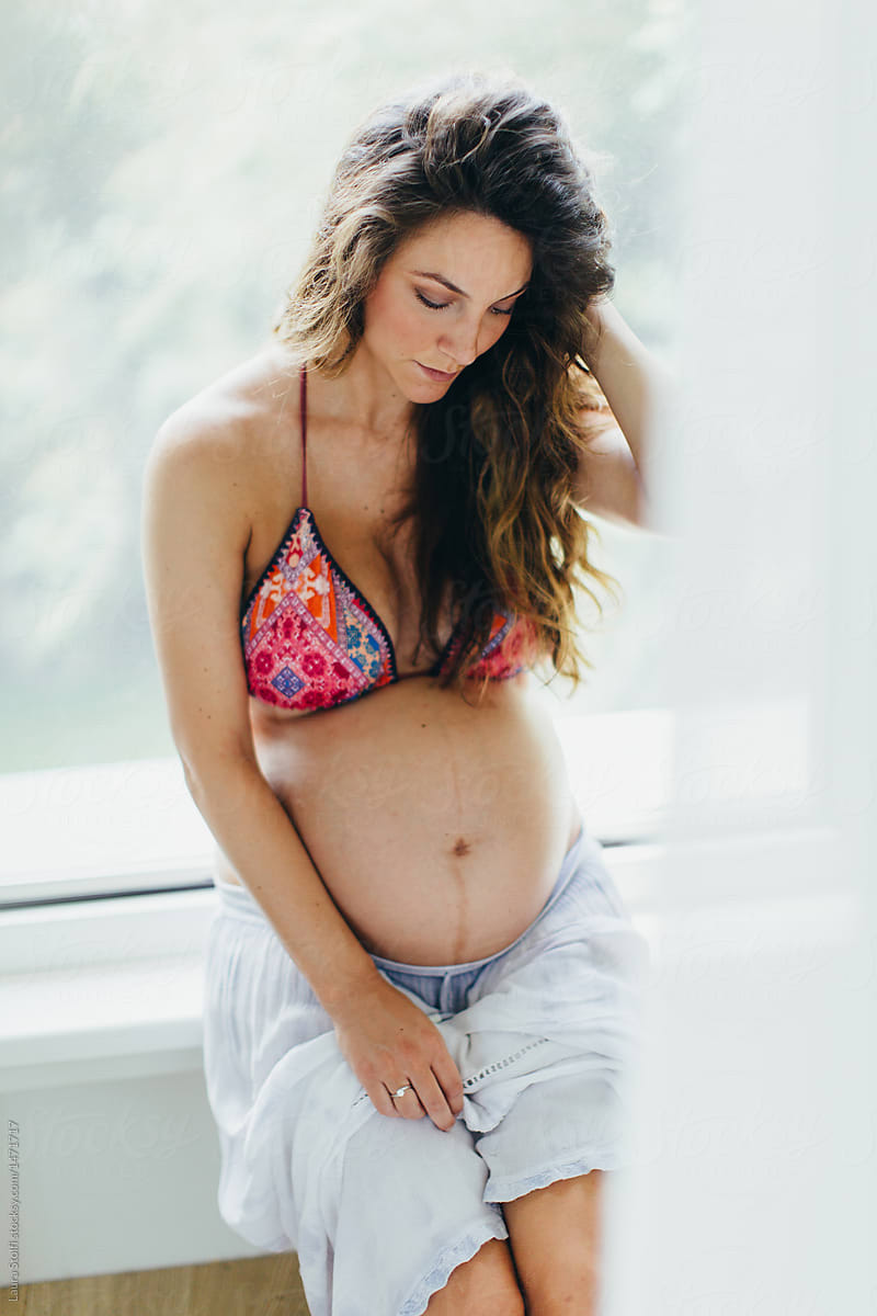 Beautiful Woman With Pregnant Bell