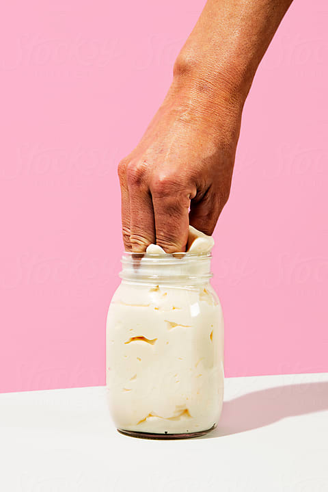 Person Putting Ice Cream To Blender by Stocksy Contributor Duet  Postscriptum - Stocksy