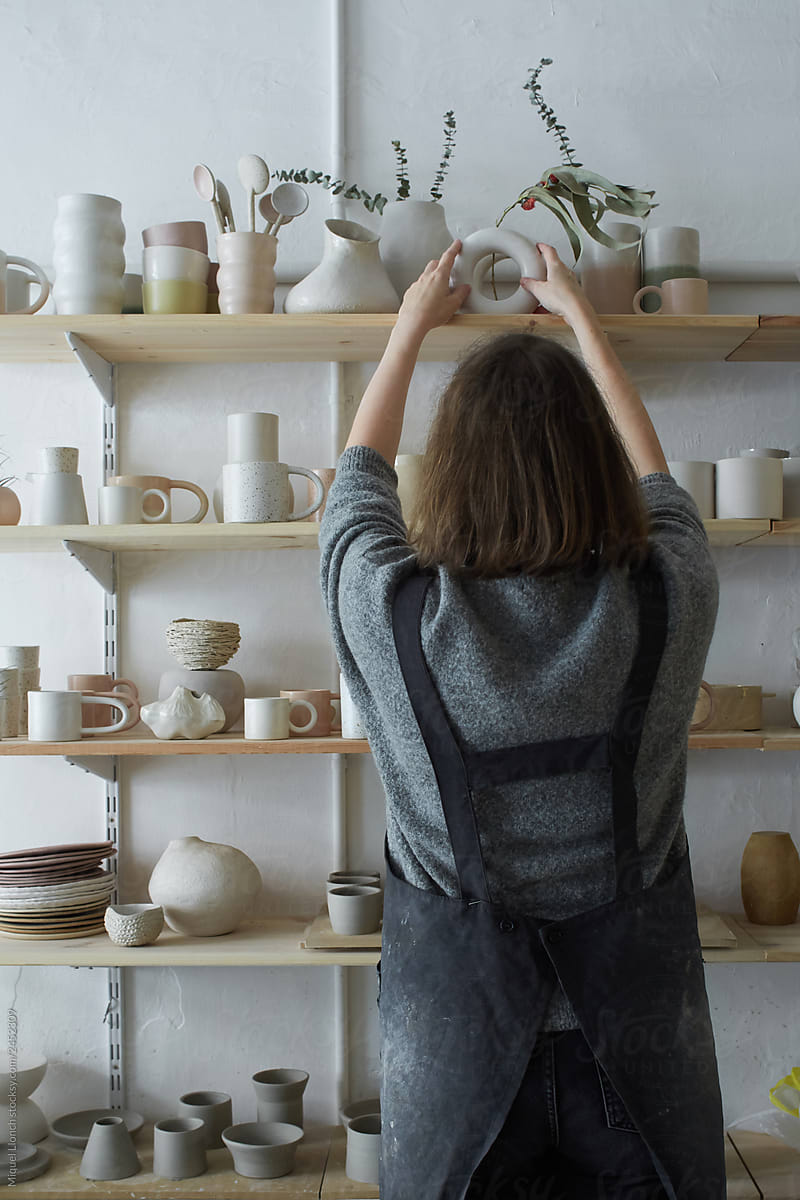 Ceramist in her pottery shop