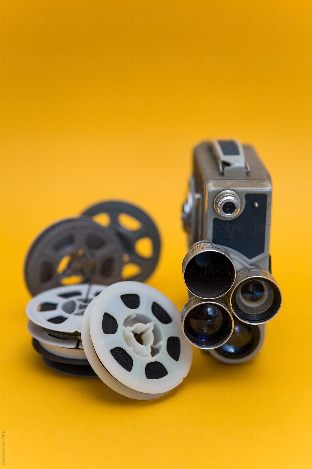 Vintage Cinema Camera And Reels Over Pink Background by Stocksy  Contributor Kkgas - Stocksy