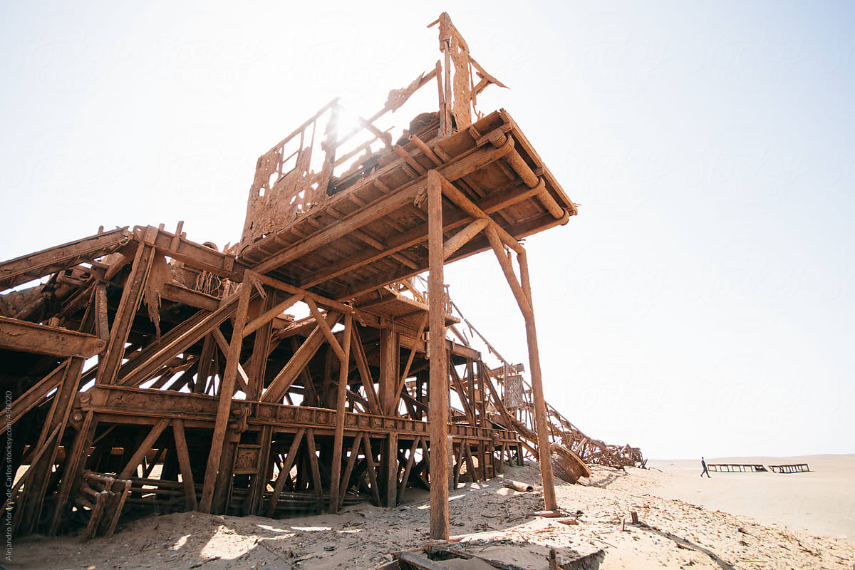 Old ruined rusty structure of an abandoned oil drilling rig in Namibia