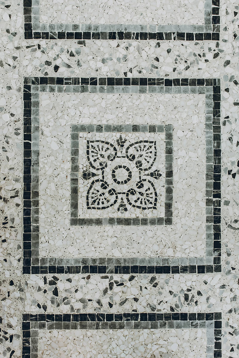Mosaic floor in black, grey and white shades in Florence, Italy