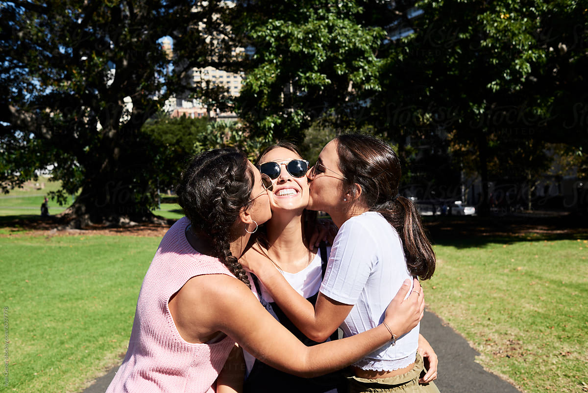 Best Three Friends Kissing Each Other By Stocksy Contributor Ivan 