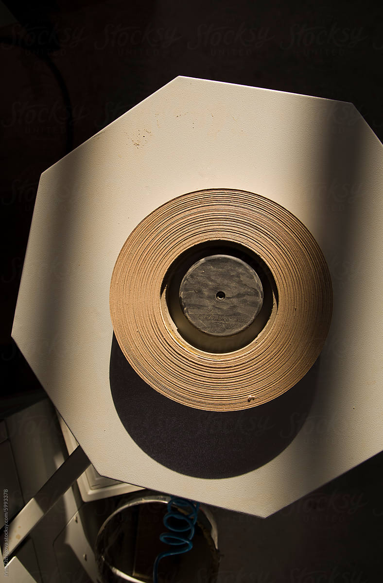 Top down view of a circular roll of a wood tape