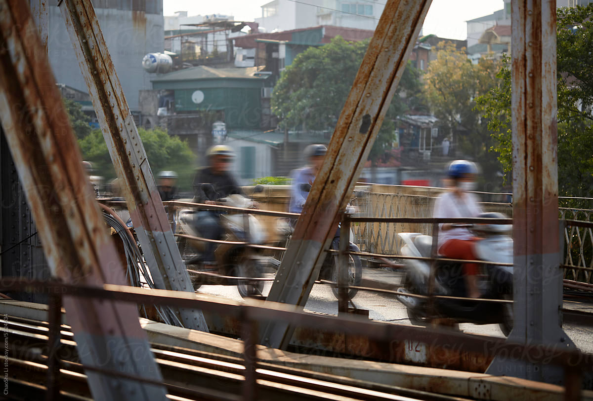 Closeup of motorcycles speeding on the streets of Vietnam,