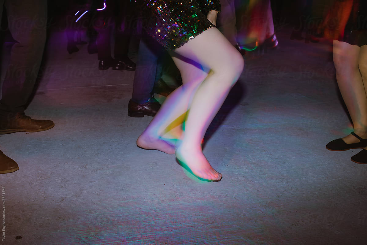 A Girl Dances Barefoot At A Nightclub By Stocksy Contributor Taylor a-girl-dances-barefoot-at-a-nightclub-by-stocksy-contributor-taylor