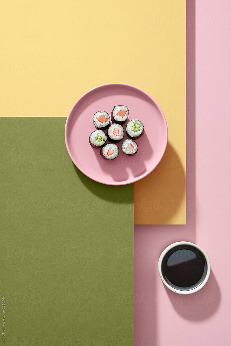 Sushi rolls on a pink plate, Japanese food