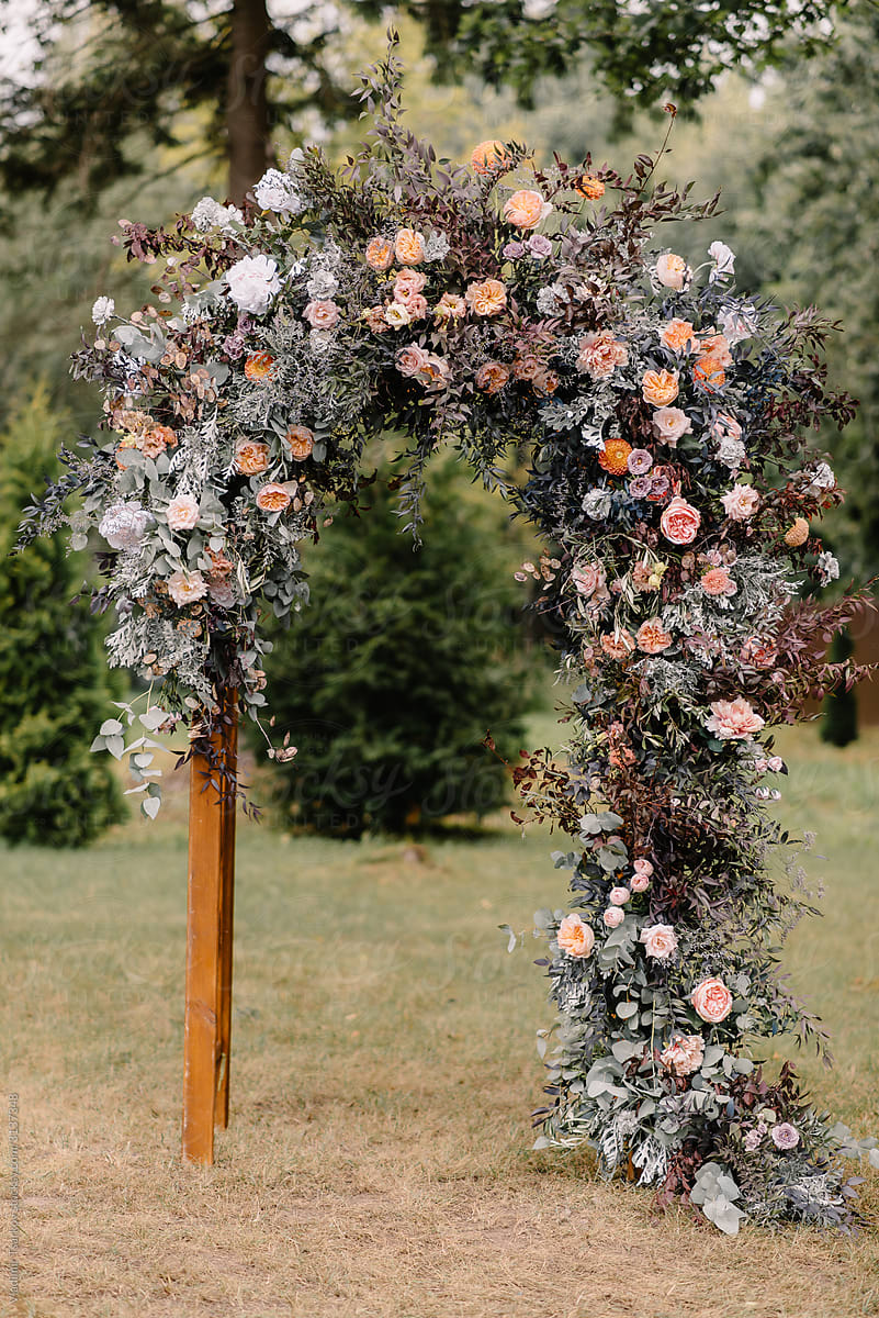 Wedding arch with natural flowers