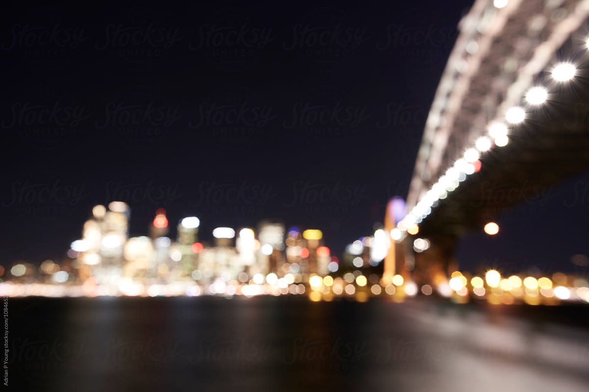 Out of focus view of the Sydney Harbour Bridge and Sydney city skyline.
