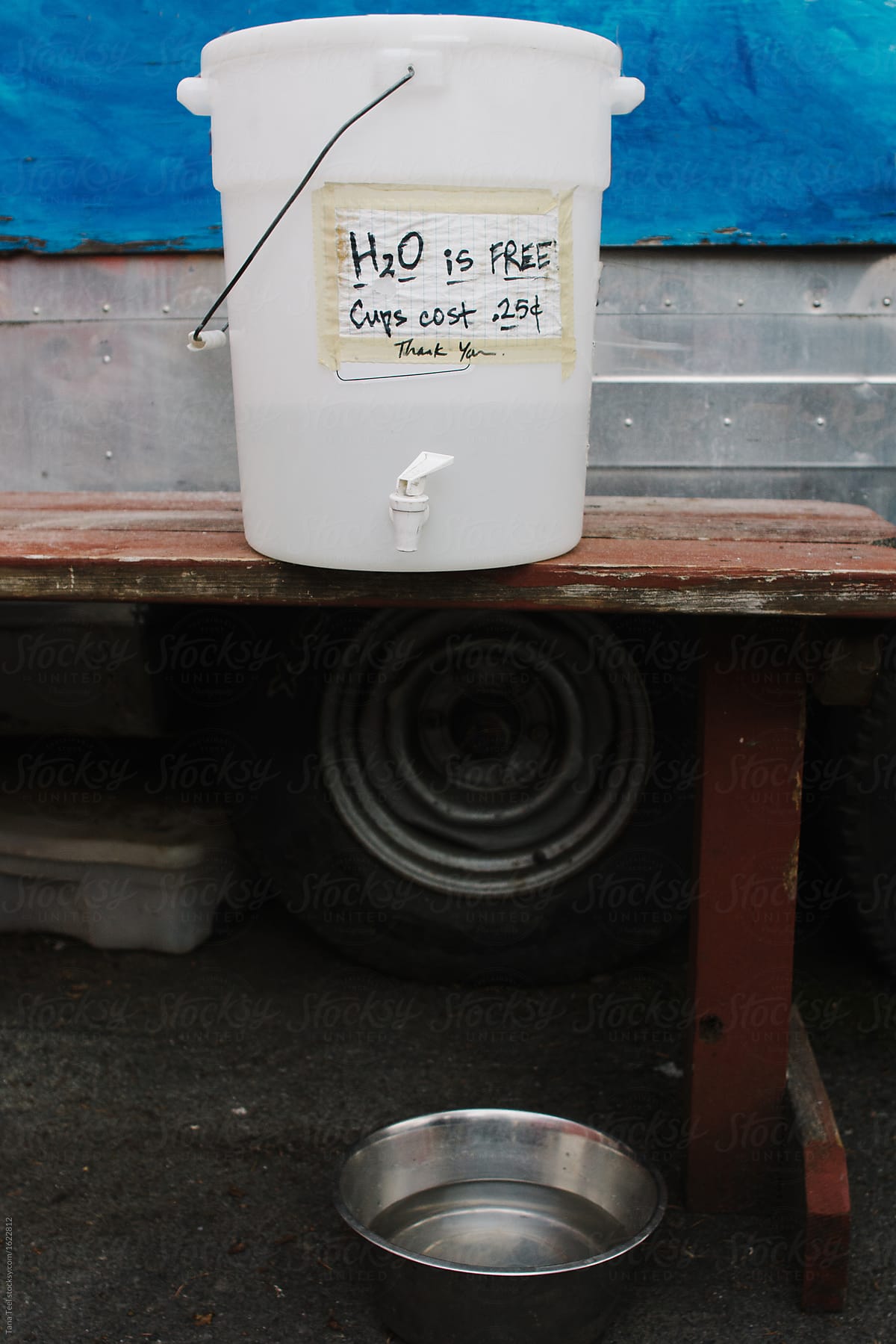 humorous sign on water bucket