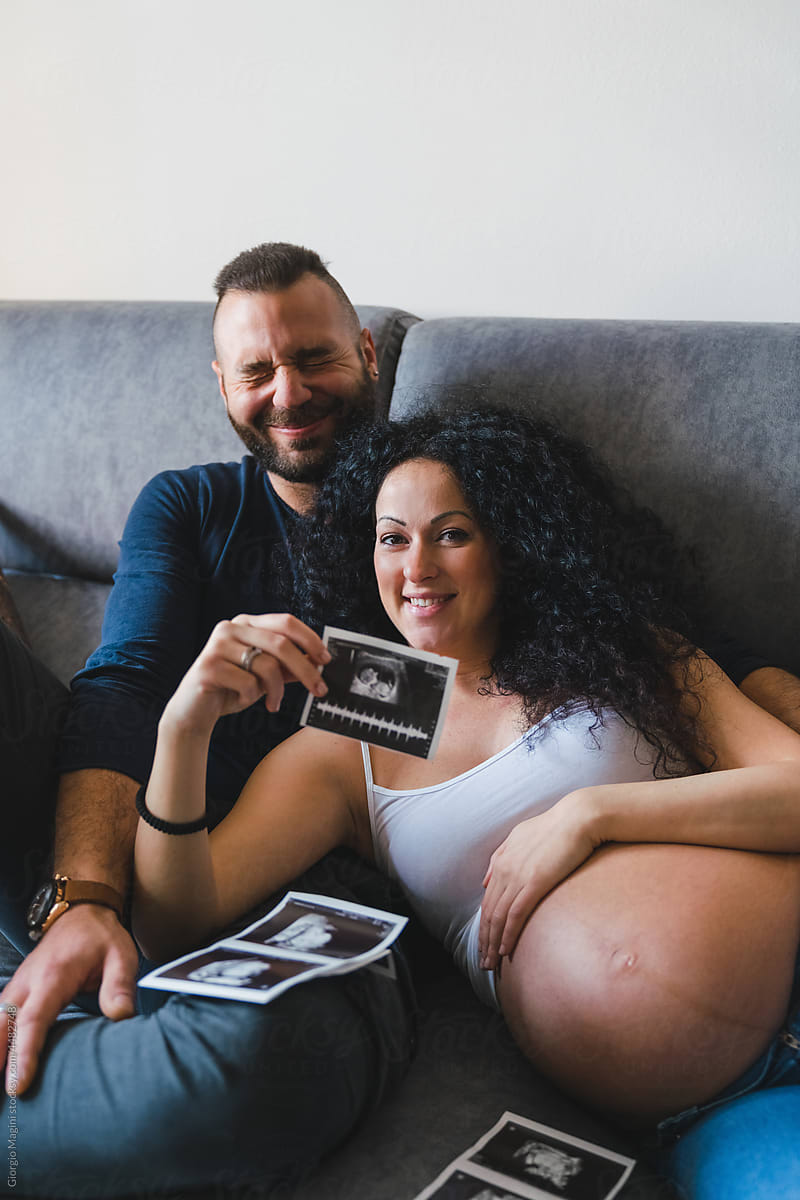 Pregnant Couple with Baby Ultrasound Scans and Heartbeat