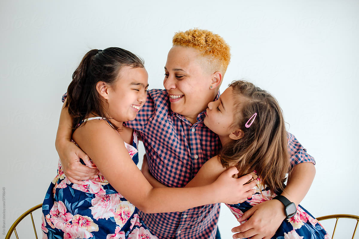 Happy mom with biracial daughters