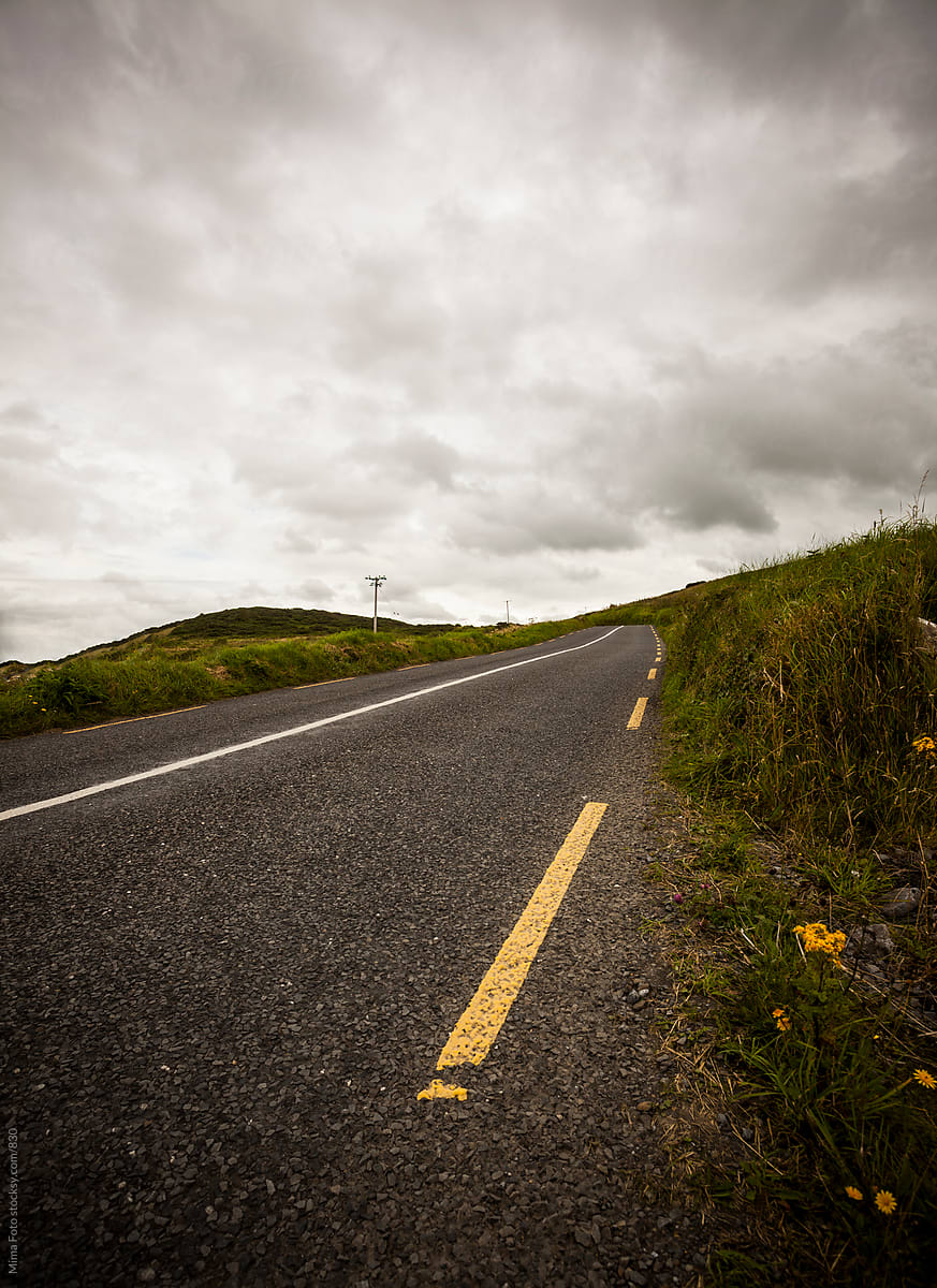 Empty road on a hillside