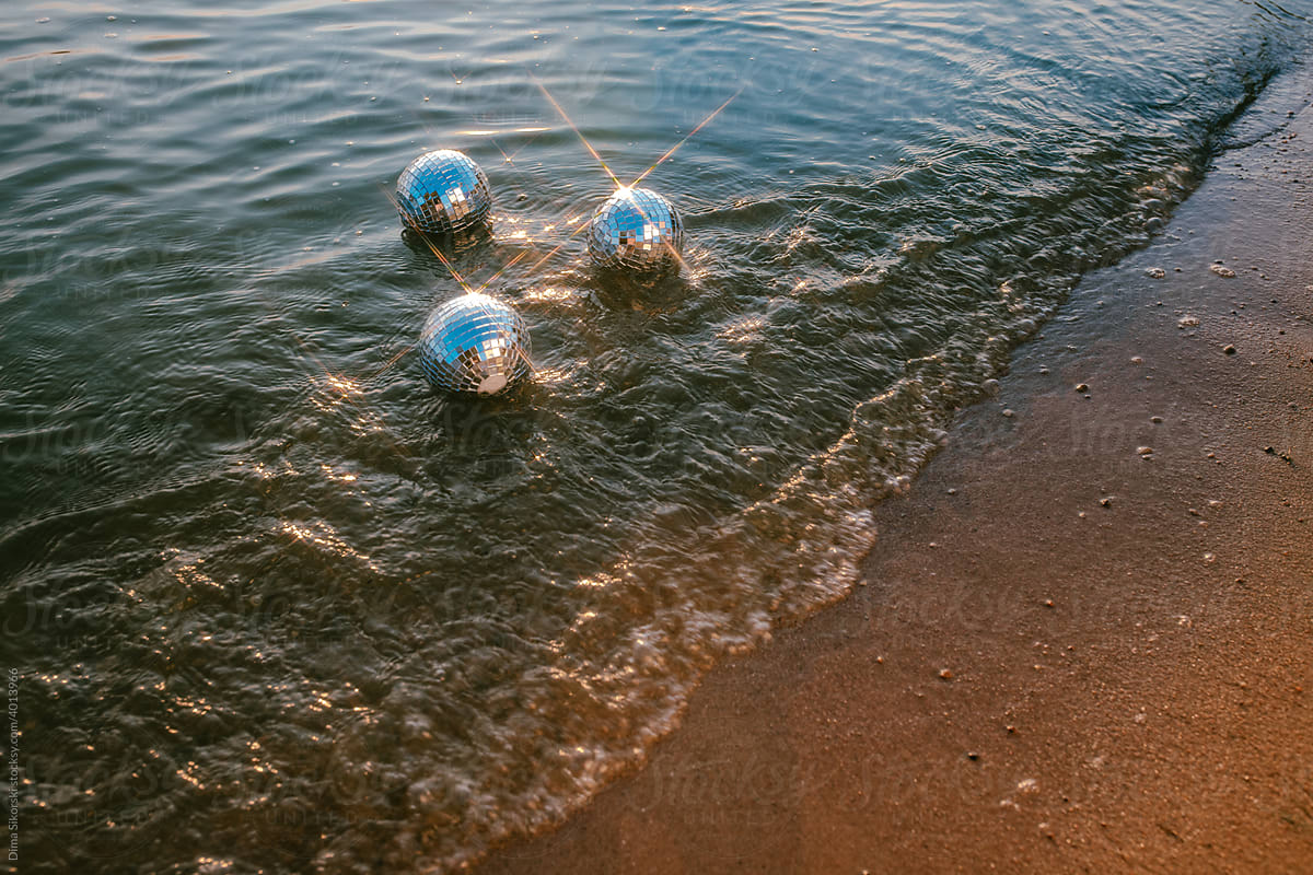 Disco ball in the water.