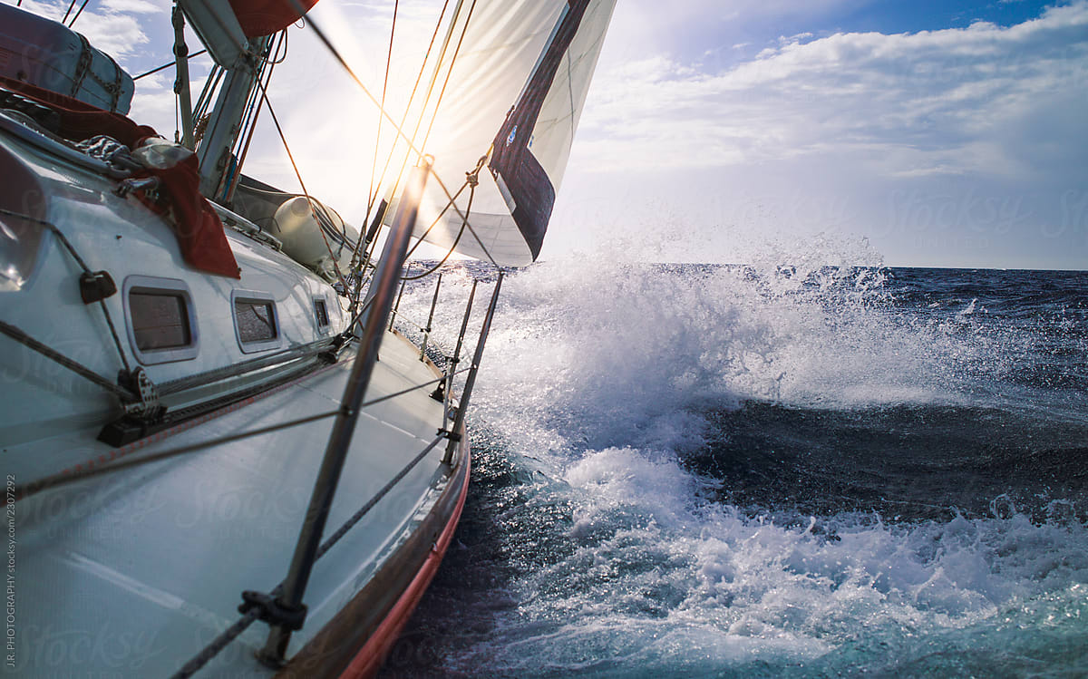 sailboat in stormy seas