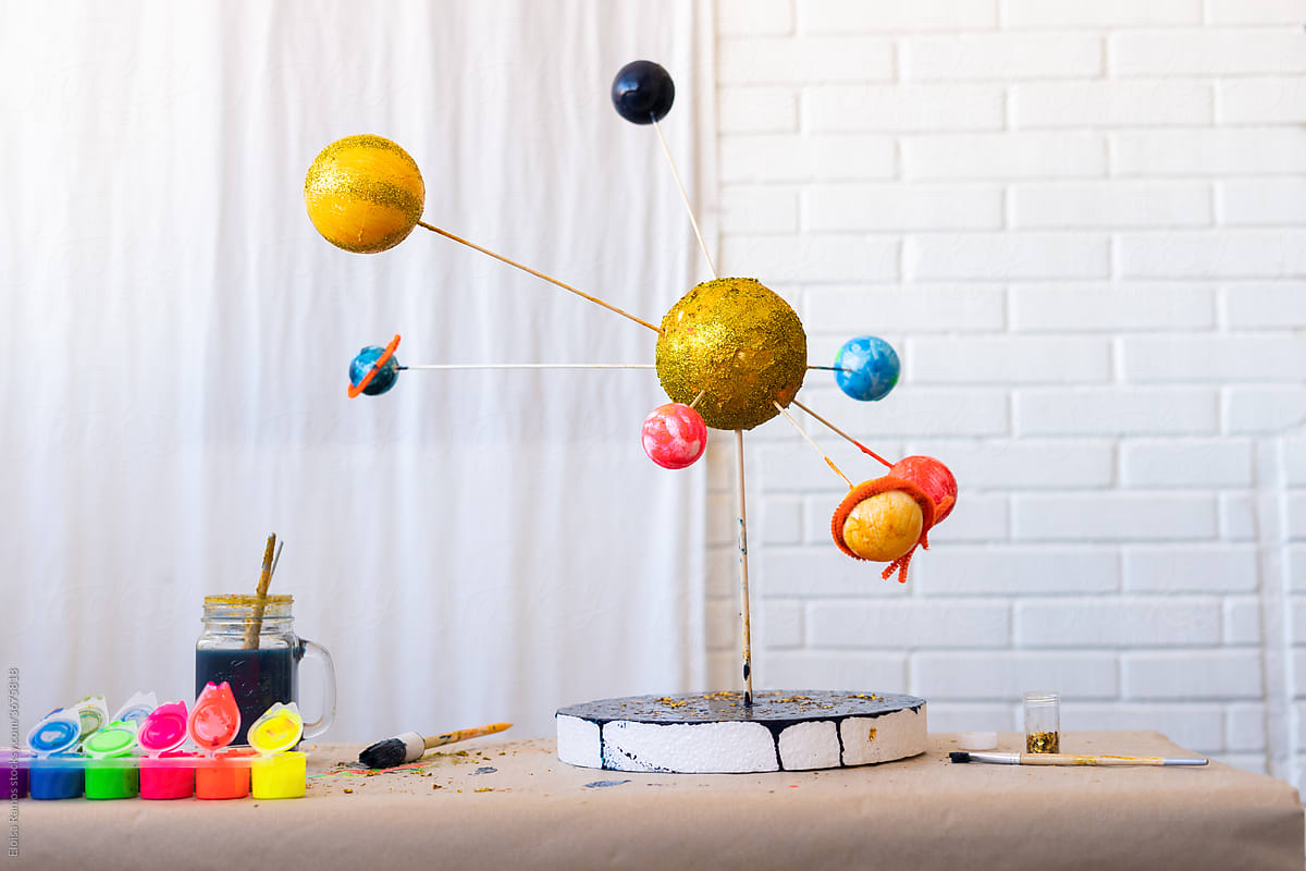 Studio shoot of solar system homework at home