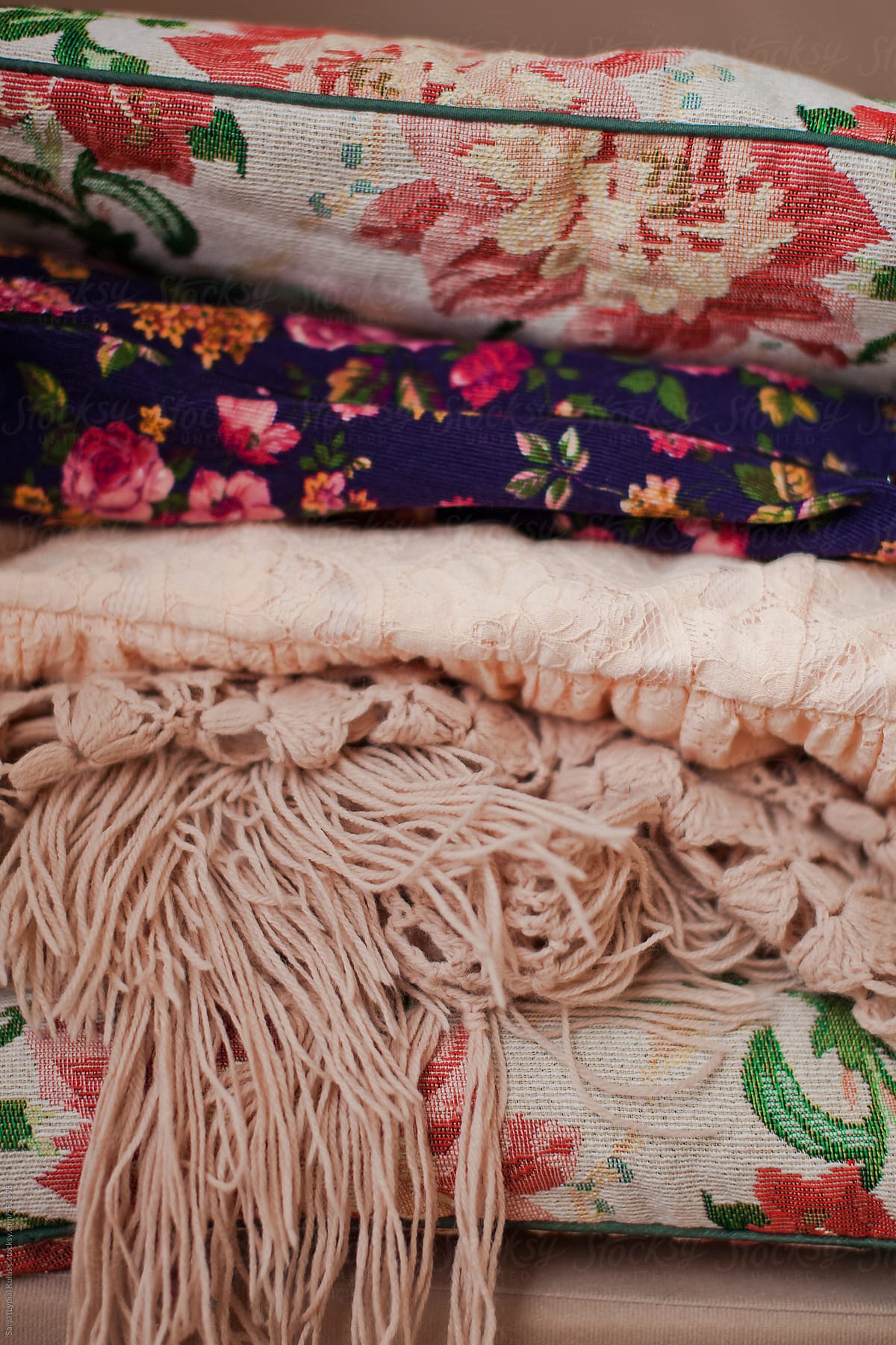 Pile of floral vintage print fabric