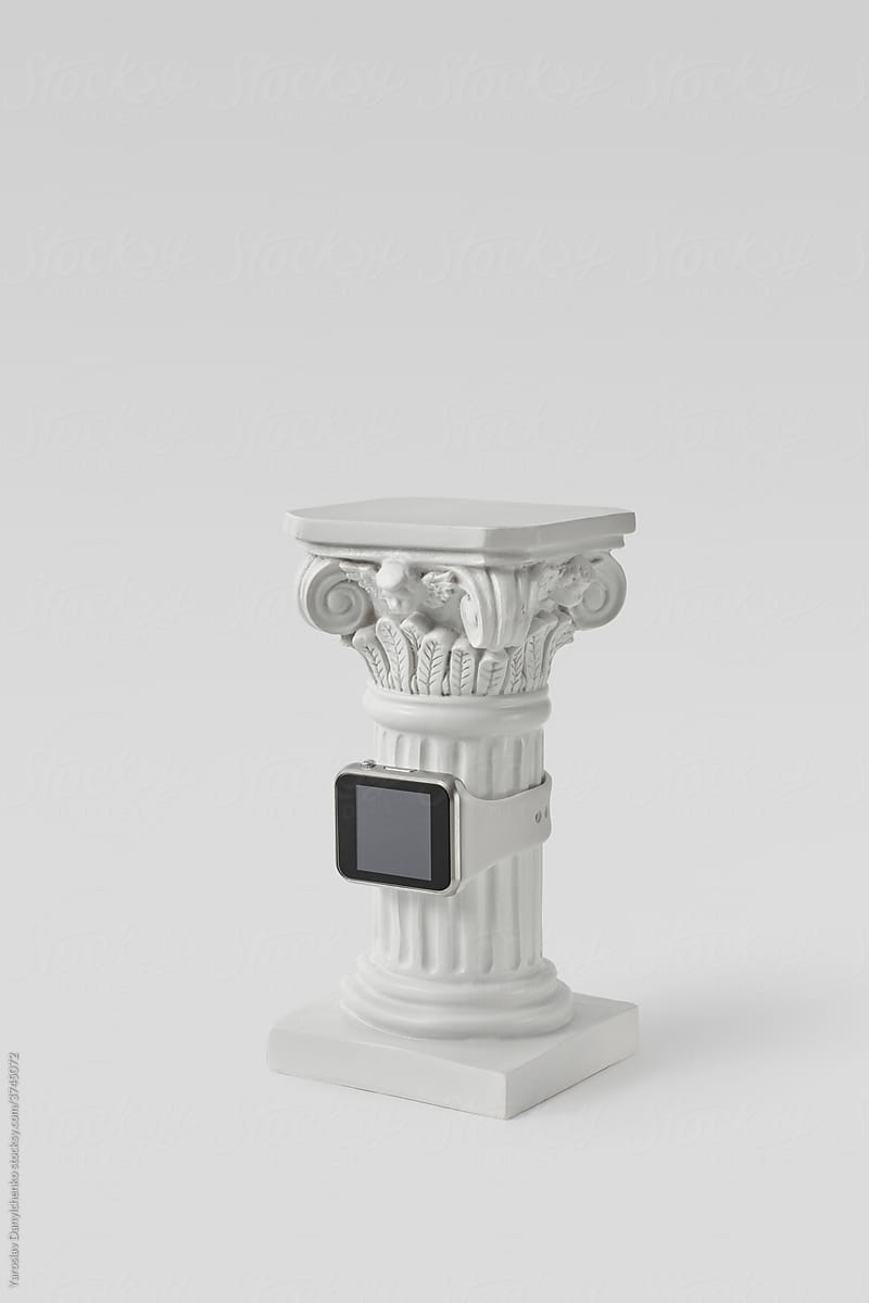 Smartwatch on white antique column