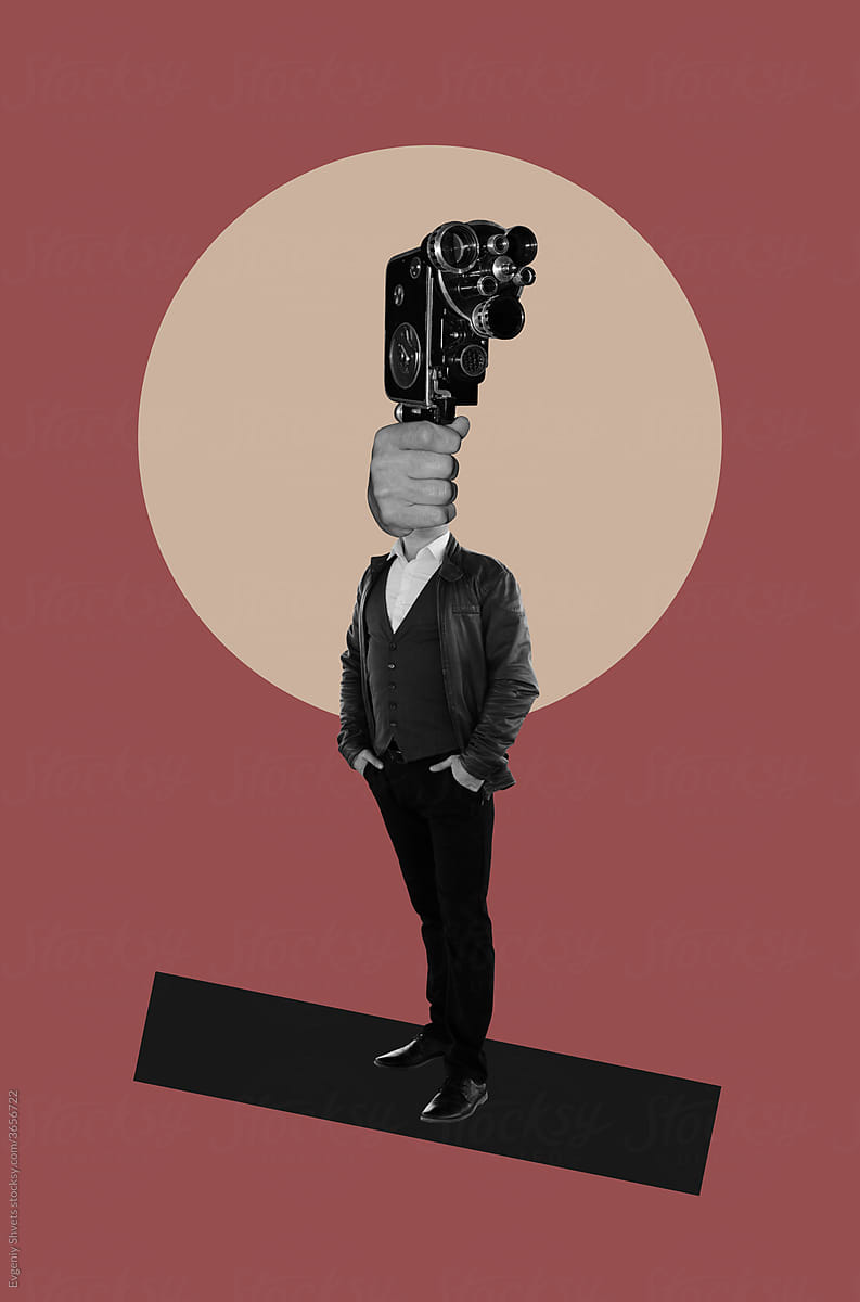 A man with a  movie camera instead of a head