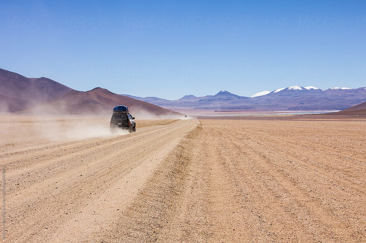 4wd car driving off road on the desert. Eduardo Abaroa National park, Bolivia