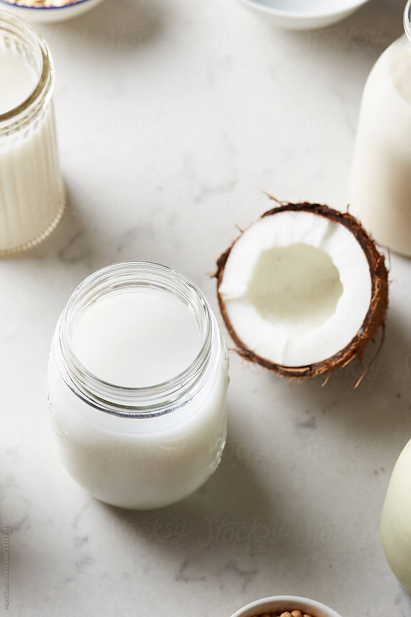 Non-dairy coconut milk on table.