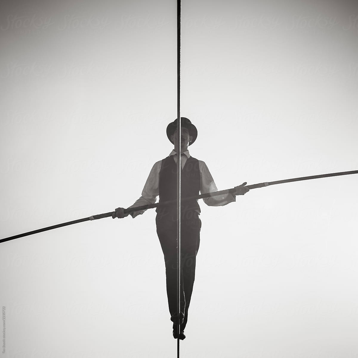 A Monochrome Image Of A Tightrope Walker Stocksy United