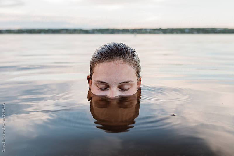 Young woman submerged in water