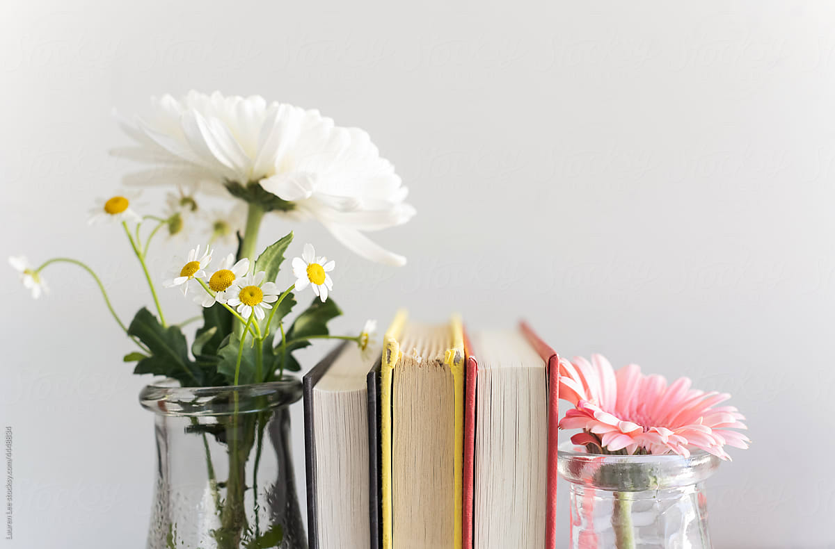 Books and flowers in a vase