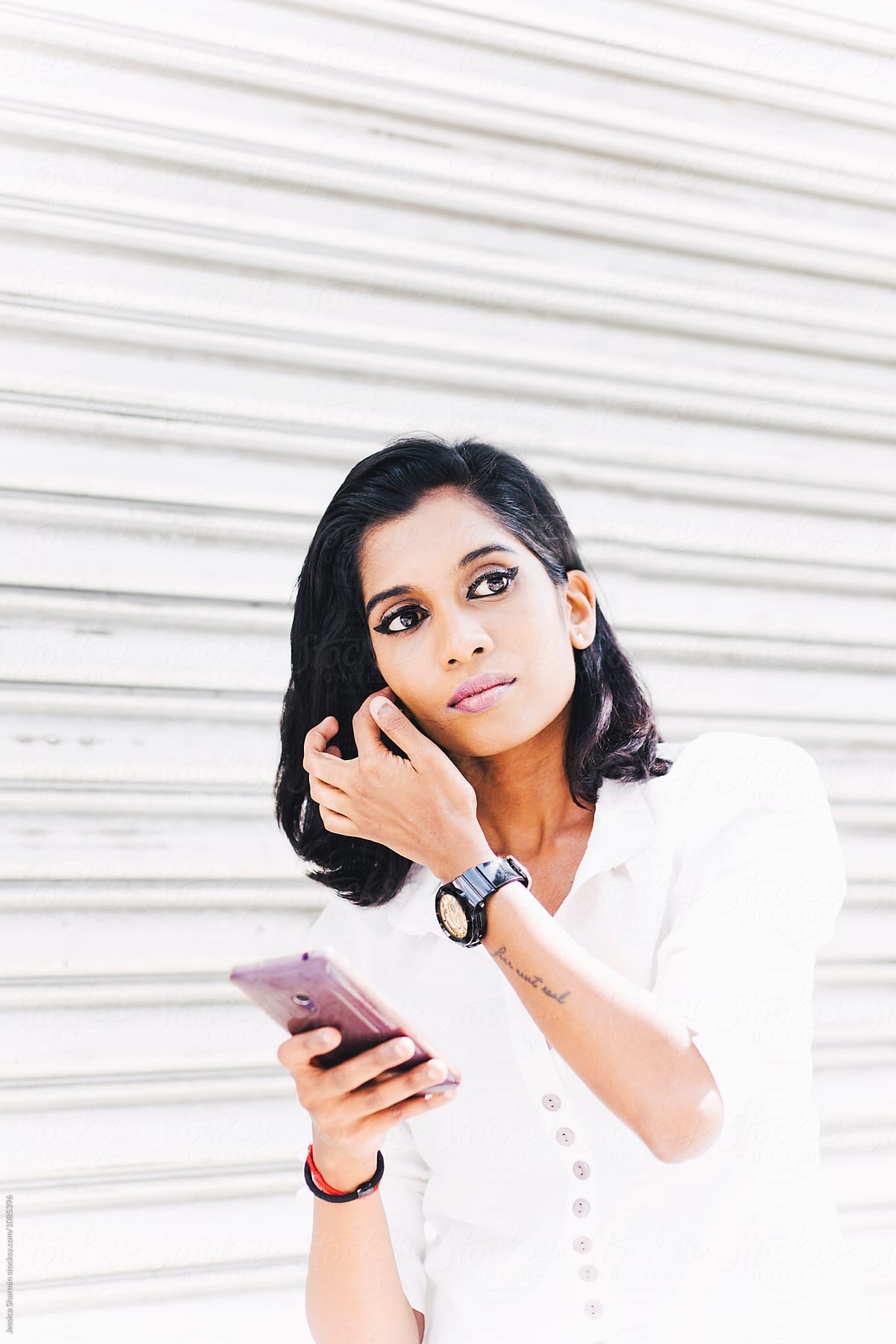 Young Professional Indian Woman Using Technology By Jessica Lia